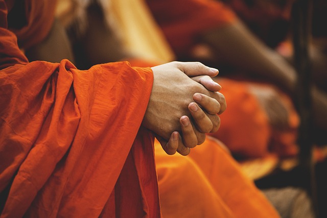 folded hands monks buddhism